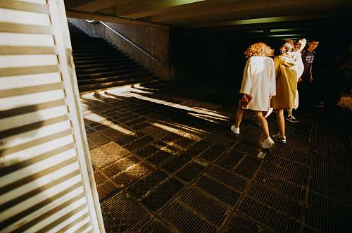 human people walking near stairs person